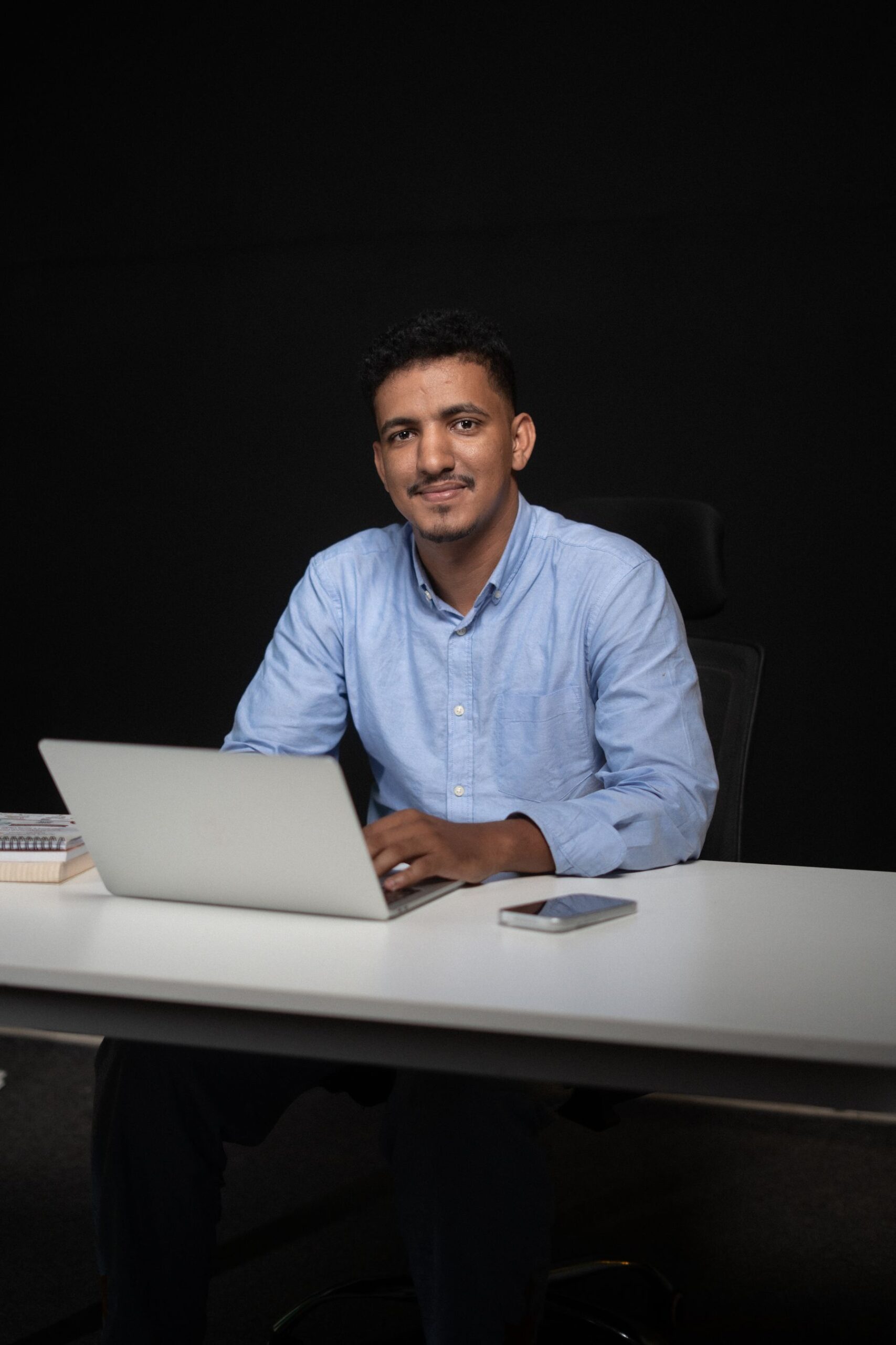 Indian local business owner managing store inventory